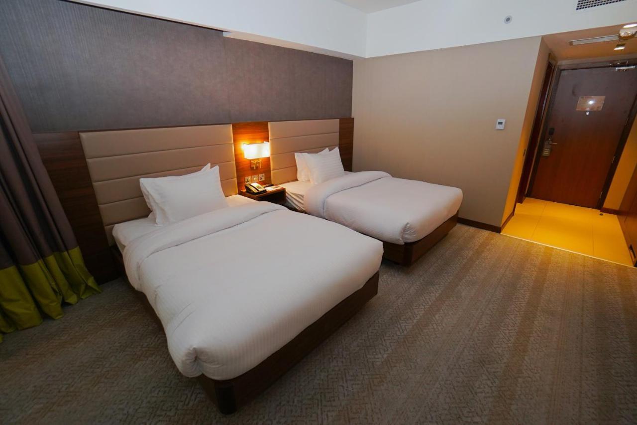 The Grand Lux Hotel Doha Exteriör bild Deluxe room