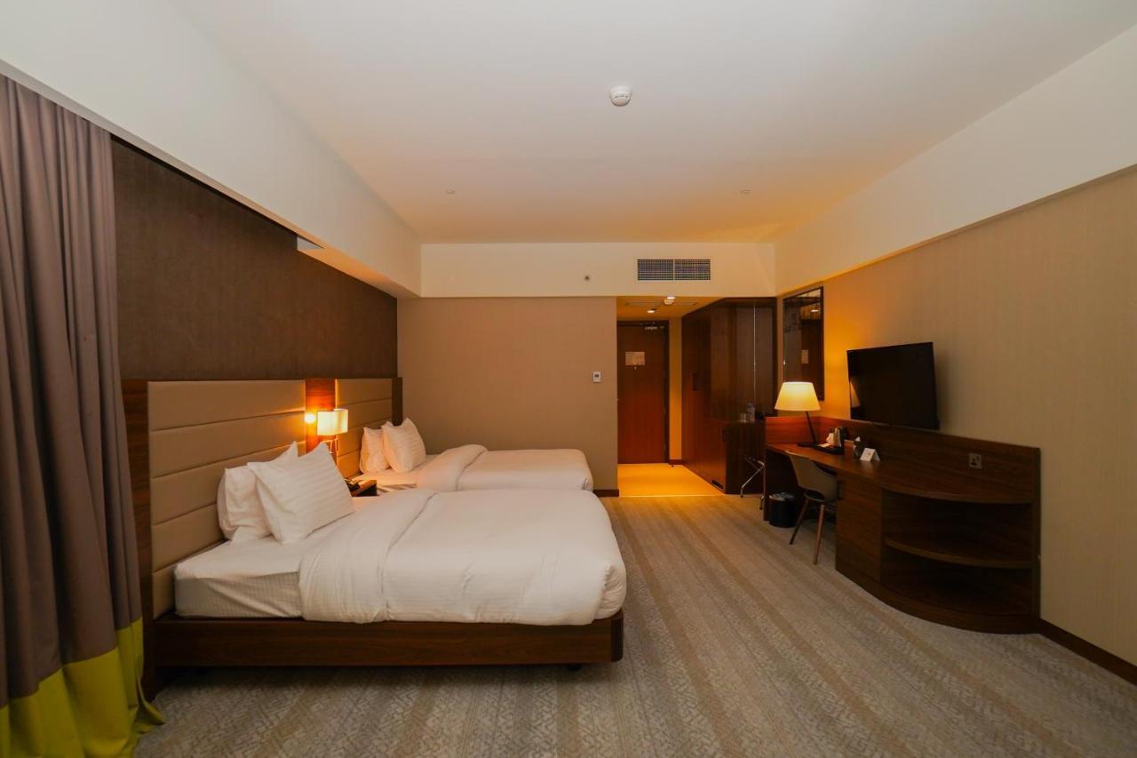 The Grand Lux Hotel Doha Exteriör bild Deluxe room
