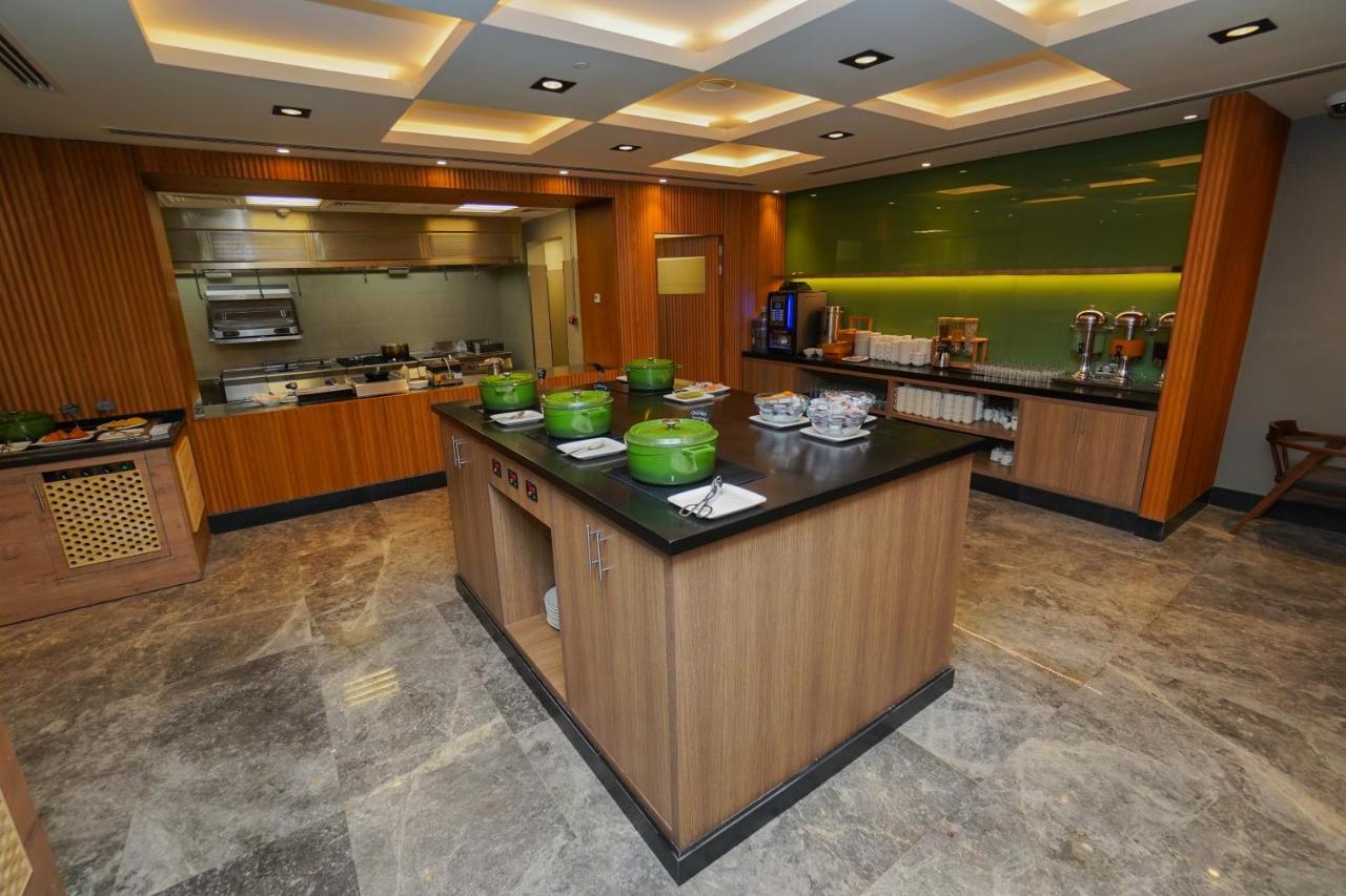 The Grand Lux Hotel Doha Exteriör bild The kitchen at the Royal Brunei Airlines VIP Lounge at Brunei International Airport